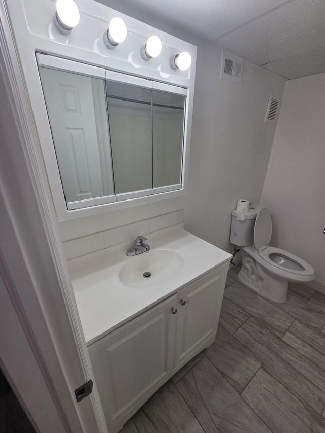 Bathroom vanity at Chateau Apartments