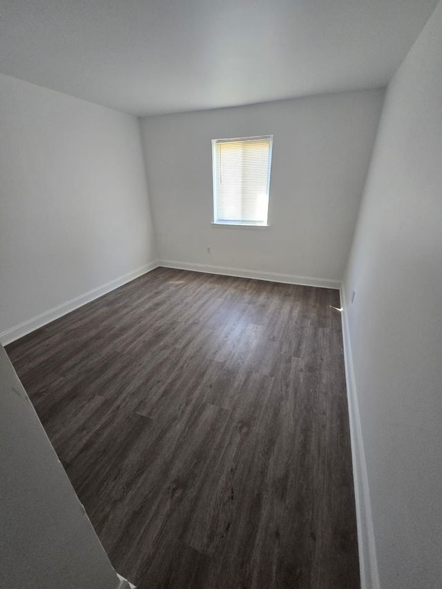 Bedroom with natural light at Chateau Apartments